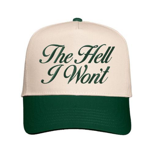Natural and Forest Green trucker hat with “The Hell I Won’t” embroidered in script font on the front panel.