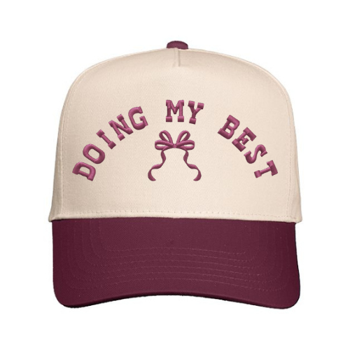 Cap embroidered with 'Doing My Best' text with bow design on a Natural & Maroon hat