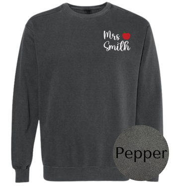 Dark gray sweatshirt with 'Mrs. Smith' text and an apple design on a white background