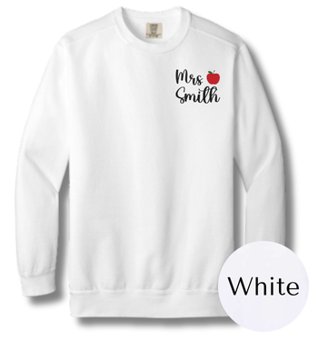 White sweatshirt with 'Mrs. Smith' text and an apple design on a white background