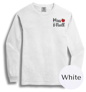White long-sleeve shirt with 'Miss O'Neil' text and red apple graphic on a white background