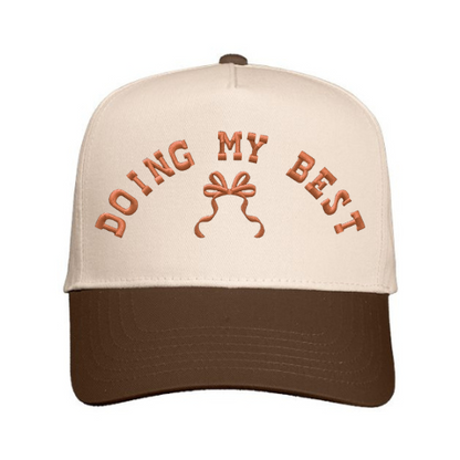 Cap embroidered with 'Doing My Best' text with bow design on a Natural & Brown hat