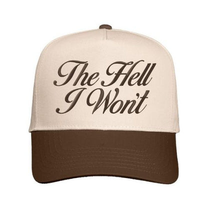 Natural and brown trucker hat with “The Hell I Won’t” embroidered in script font on the front panel.